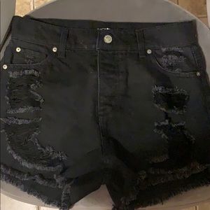black high rise distressed shorts